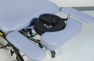 massage head section with variable position armrests, massage table, treatment table, hi-lo table